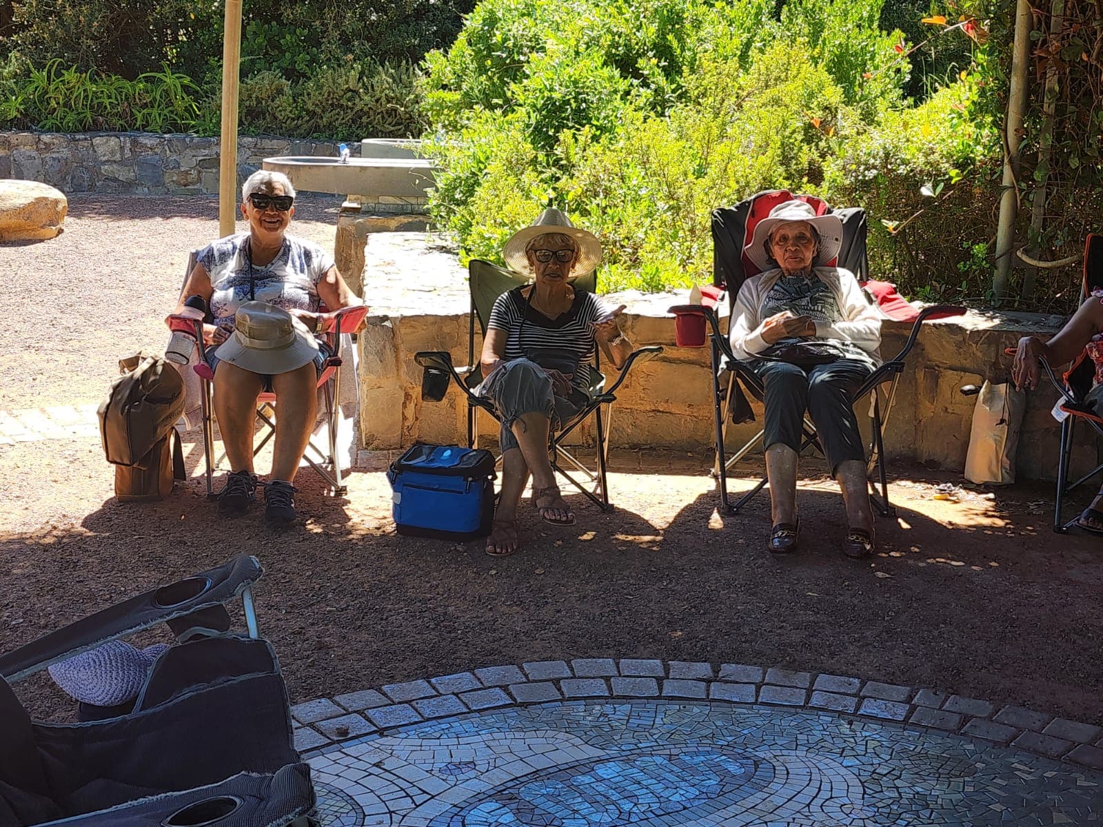 Seniors sharing a joyful meal together at JACS